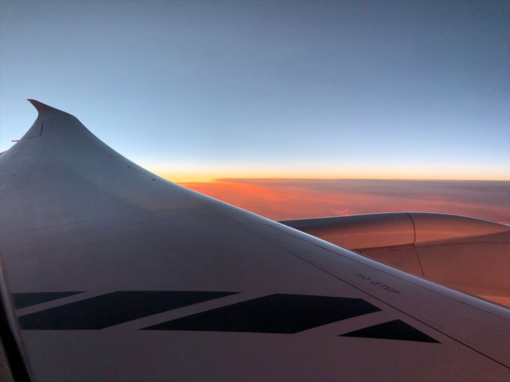 JAL422便ビジネスクラスから見た夕焼け